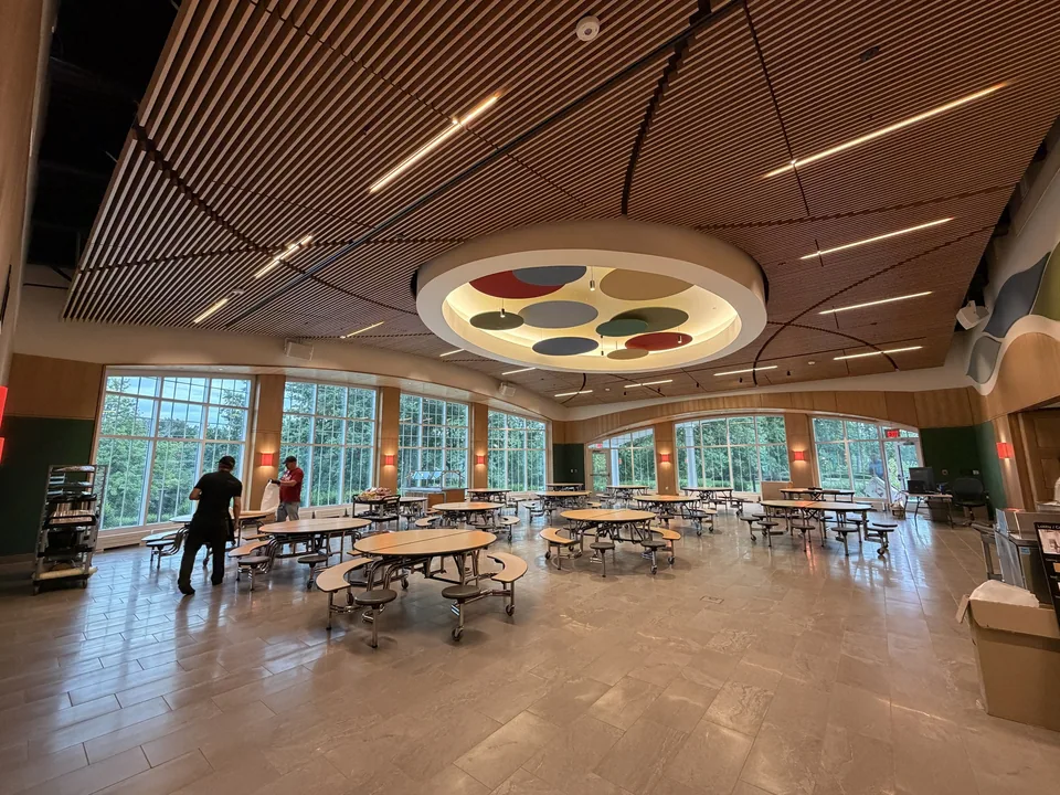 CKC precision wood ceiling and millwork in an education commons.